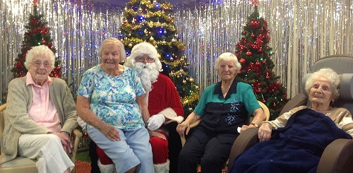 Four Centenarians Visit Santa