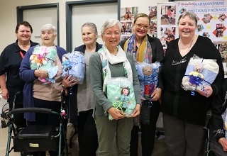 Seniors Gift Newborn Care Packages to Families in Need