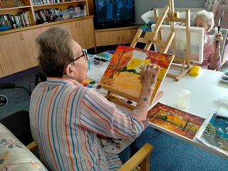 From Canvas to Masterpiece: Residents Showcase Their Talent in Painting Classes