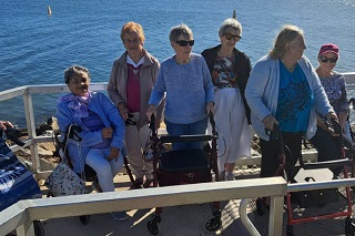 Regis Port Macquarie Residents Delight in Community Outing: A Day of Sunshine, Friendship, and Fish & Chips