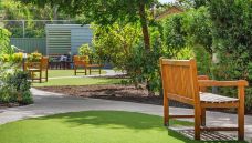 Bupa-Aged-Care-Woodville-garden-with-chairs