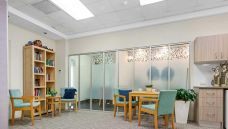 Bupa-Aged-Care-Enfield-library-nook-and-kitchen